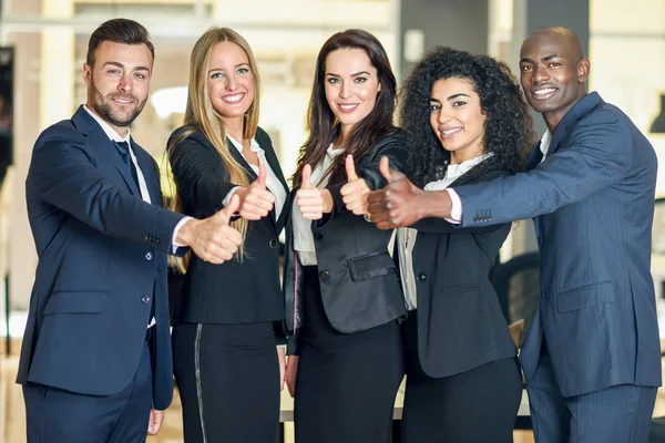depositphotos_153963544-stock-photo-group-of-businesspeople-with-thumbs